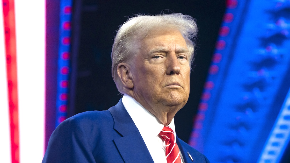 PHOENIX, ARIZONA - DECEMBER 22: U.S. President-elect Donald Trump looks on during Turning Point USA's AmericaFest at the Phoenix Convention Center on December 22, 2024 in Phoenix, Arizona. The annual four day conference geared toward energizing and connecting conservative youth hosts some of the country's leading conservative politicians and activists.